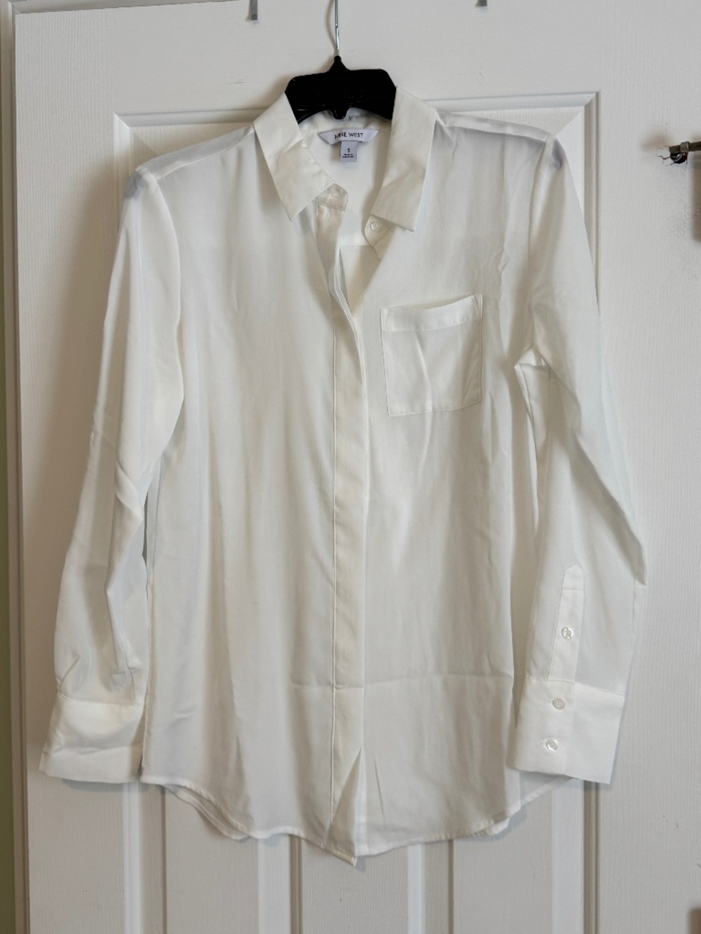 White long sleeve button down blouse with collar